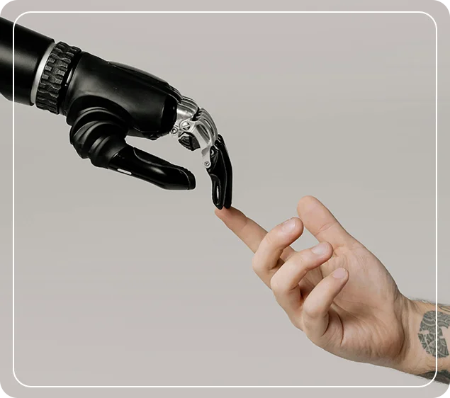 A robotic hand and a human hand reaching toward each other